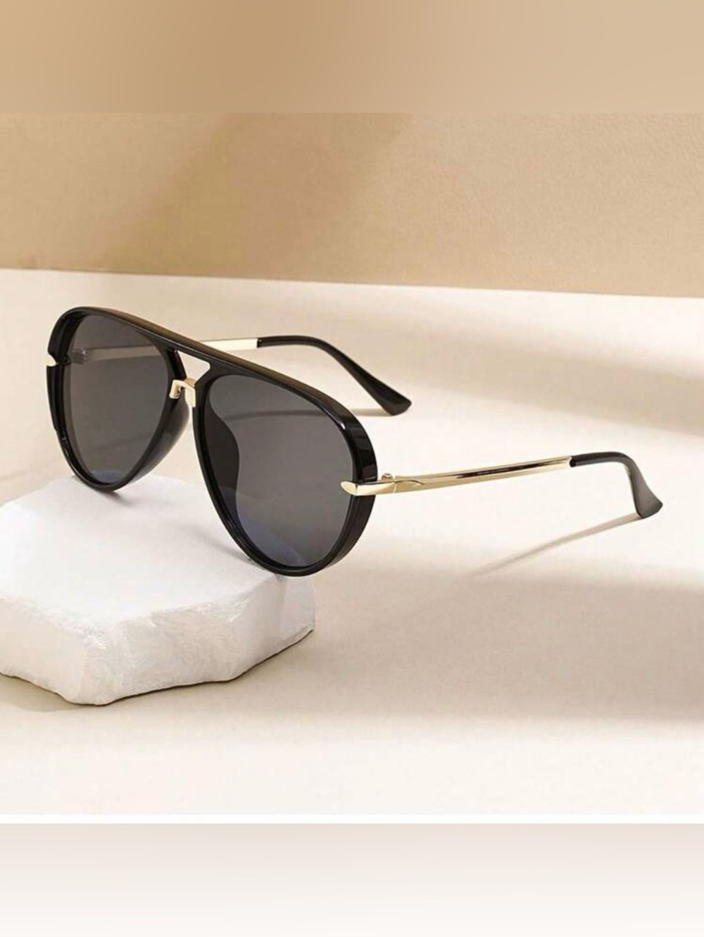 Sleek Black Aviator Sunglasses with Gold Temples